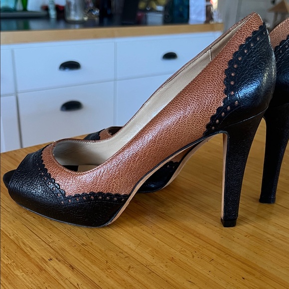 kate spade Shoes - Kate Spade designer Black and Tan Peep Toe Heels made in Italy 7B